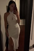 Absolutely beautiful, good material, not see through. I would say if you want it to fit looser like on the model order one size up. I happen to love the way my fits a little tighter though! - Lexie M.
