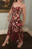 Such a beautiful dress! The embroidered detailing was perfect for the "garden formal" wedding I attended. The fit was great. Appreciated the adjustable straps and the tie back. Received many compliments and felt great all throughout the wedding (especially on the dance floor!). *There were some loose threads from the floral embroidery work, but was simple to trim. - Katy F.