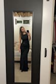 I bought this dress in a size small. According to the website, with my body type and everything, I should be a medium. However, I got a small based on other reviews, I like my dress to not be tight but lay flat against my body. This dress is perfect for that, very flattering! Even with my larger bust size, I can wear no bra which is amazing. Originally this wasn't the dress I wanted, but I am so happy I ordered this one. I usually size down slightly for things. I don't like loose fitting baggy clothes and I'm glad I went with the small! :) - Abigail M.