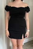 This dress is SO cute. Very flattering too. Unfortunately the sleeves make it hard to raise your arms. Since my boyfriend it 6' it wasn't a practical dress for me, but still so cute. - Sadie W.