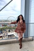 This dress definitely brought on the idea I had in-vision to life. Couldn't decide if my boots complimented my dress or my dress the boots. It goes so well with the traditional turquoise accessories. I actually wouldn't mind recreating this look for my next rodeo at all. - Briselda A.