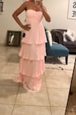 This dress is super cute, good material, but I had to return because it was too long for my length. I felt a little chubby in it too. But still cute. - Josy O.