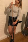 The material looks really nice, not like cheap fake leather. It's a little tight, but i have a feeling it will stretch over time. I would recommend going up a size if you have a larger bottom since the fabric doesn't give much. So many compliments everytime I wear this! - Brittany J.
