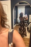 The dress is stunning for a fall wedding but I couldn't zip the back over my chest. I hate it because a larger size would have been far too large everywhere else. - Lesli M.