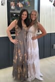 Ordered this for a bridal shower to match the grey color scheme. It is a beautiful dress however it runs a bit large. The sleeve adjustment helped! - Shania M.