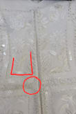 I bought this dress for my elopement. When it arrived, I tried it on, loved it, and put it away in the spare closet until I needed it. I bought it 6 weeks in advance, so I haven't touched it since it arrived. When I pulled it out of the closet today to do one last try on, I heard beads hitting my tile floor. Upon closer inspection, there are many beads missing from the back. There are frayed threads everywhere, and there was a very large knot in the thread where someone had attempted to tie up loose ends. My elopement is tomorrow morning, and I have no time to replace the dress. I just have to hope I've tied up all the ends, and I don't lose beads all day. I wanted to love the dress, but now I'm just so sad about it. - Kendal L.