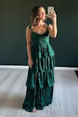This dress is beautiful. The coloring, subtle pattern, and ruffle details are so good! Unfortunately, this was a bit too big in the chest and through the rib cage. I wouldn't size down because it may be too tight. Could have taken it to get altered, but went with a different dress instead! - Megan S.