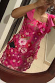 This dress is BEAUTIFUL! The color is very bright and the flowers are super cute. The only problem it has is that it runs too small. I am usually a S or M but I read the comments about the issue with the sizes, so I decided to go for an L, and thank God I did. I also agree with one of the other comments about the length. I am 5' 3'' and the length is right for me but I am not sure if it will be the same for someone 5' 5'' and above. - Hellen O.