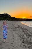 I wore this dress for a family photoshoot on a Maui, Hawaii beach. It was just perfect in every way. I'm normally a size small in most brands, and this small fits true to size. I'm 5'4" 120 pounds 34B. The midi length was great because Hawaiian beaches are notoriously super windy, but my dress never flew up during the photoshoot. A shorter knee length dress would have. There is a thin liner in the dress as well. You could get away without wearing a bra, but I wore nipple covers called "cakes" just in case instead of a bra. The back of this dress is adorable with a peek-a-boo window of your lower back which is flattering. The spaghetti straps are adjustable which was helpful, and there is a hidden zipper on the left side of the dress. I had my four sons and husband wear different shades of blues and teals to match the blues in this dress. I can picture myself wearing this dress for many other occasions. It's great quality, comfortable, not restrictive at all, and the purple color is just stunning! - Kelley K.