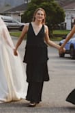 The dress was perfect in all its ways and the bust area was perfect and there was no need for a bra but it was soooo long. Definitely needed to get it hemmed - Erica T.