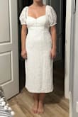 Bought this dress to wear at my Bridal Tea Shower and it's perfect. The lace is beautiful and great quality. The back is super flattering but the elastic in the back is a bit twisted. - Hailey R.
