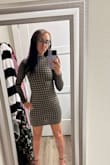 WHOA! My size is typically XS in everything including Lulus. I bought this to wear to work, and there is absolutely no way. It's so snug that it leaves nothing to the imagination, AND it's short on which is a feat in itself as I'm only 5'. The colors are way off from the photos shown. It's a lot darker in person. This would work great if I was trying to go clubbing in this, but I bought it for work as, on the model, it shows it's a tad loose. This won't work for me at all and will need to be returned or exchanged. The material feels nice enough but not $59 worth AND that I have to exchange it for a much larger size, that's ridiculous to me. If you buy this, DEFINITELY size up two sizes, even if you think you're small, you're not this small. Trust me. - Kay F.
