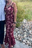 I ordered a medium and it fit almost perfect with just a little tight in the hips and a bit big in the bust.  I had to try about 6 different bras to get the right fit.  I received so many compliments and even had someone who saw my social media post send me a message asking me where I bought the dress!  So cute and I loved it! - Susan F.