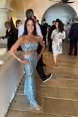 I am blown away about the perfect fit of this dress. The only alterations I had to do was the length and I was complimented by so many people, and the mother of the bride. Capri, Italy is known for the Aqua Blue Waters, and I was so happy I wore this. My husband was blown away as well. - Stacey P.