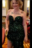 I bought this for a disco gala I attended. It was super flattering. Lots of compliments. The clip in the back did scratch me a lot by the end of the night. Could easily sew some fabric over it. The feathers are not sewn in along the seam, just like every few inches or so, so be careful getting caught on anything. I will wear this dress again, given the opportunity. - Jynnifer D.