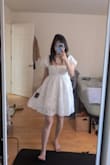 The dress is super adorable but runs a bit large. - Linh N.