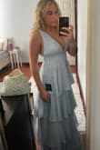 It fit my body very well, but it was a little bit big on my chest. I ordered a small and it wasn't too tight at all. It is more blue than white in real life - Sophie B.