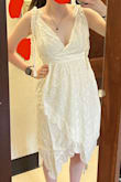 I'm too pale for white dresses; it is def NOT my color. But I think it fits okay. Could be better but oh well. I think since it's 100% cotton. I am going to tie-dye it and see how that goes - Sydney V.