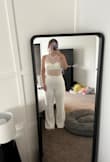 It is of great quality! I love the look and the fit, not restricting. The only issue I have is that there's no support for the chest. It would be best with heels, the length really allows for that. Potential to get it hemmed if not! - BOBBI S.