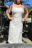 I bought this for something wedding-related, but I'm not sure if I would necessarily reach for this one unless I had no other options. Material is really nice; the straps are cute; the length is nice. The back has a little bit of stretch so size doesn't need to be perfect. - Haley V.