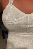 This dress is beautiful and well made. I was hoping to wear it to my rehearsal dinner. The only thing is the top is not lined with any type of underwire to support your bust. The top lining of the dress doesn't line up with the bust with or without a bra! If you have big boobs 10/10 DON'T recommend. If you are smaller up top. This would be a gorgeous fit. - Chloe K.