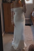 This dress is seriously so beautiful. It fits perfectly and it so comfortable. 

The only flaw and why it's not 5 stars is because of how tight the tulle is at the top of your arms. Will need to take somewhere to get that loosened. Other than that it's perfect I can't wait to wear it for my rehearsal dinner - Sarah H.
