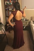 I bought this to wear as a bridesmaid dress in my friends wedding. I'm seriously in love with this dress. I wanted to buy a medium but they were all out, so I ended up buying a small. I'm very happy with my purchase. It runs a little snug but I did buy it smaller. The material is so soft and extremely comfortable. The dress is a tad long but I think it'll be the perfect length with some heals. The dress looks a little dark in my photo but that's because of the lighting. The dress came in about a week later (maybe 2 max) and the customer service chat was very helpful when I had questions about sizing. - Abigale O.