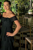 I loved the dress, really comfortable, fits true to size. I bought it for a wedding and I got good compliments. - Karla B.