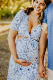 I sized up for maternity pics (normally a medium), and this dress was PERFECT! - Sydney E.