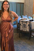 Beautiful dress! Great material and is very flowy. A little more revealing than I would have liked, but with the right bra, it worked out just fine! - Tiffany D.