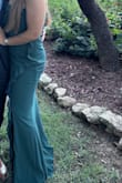 It was very flattering, and the color, ruffles down the dress, and neckline all worked so well together!! - Izabelle R.