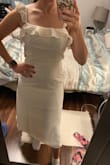 For me the dress runs a little longer, but that's fine. It's a really cute dress . The color in person looks like more beige than in the picture. The fabric is very light and maybe a little transparent, I would say. Overall I liked my purchase!!! - Michele S.