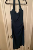 The dress was beautiful but it's a little too small. The model was wearing an extra small, and we are similar in size, so I thought that a small would be ok. 

I went with my second choice of dress because it fit perfectly! - Sophia P.