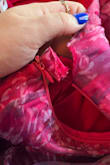 I bought the dress for a wedding in North Carolina. I tried it on when I got it and the zipper kept sticking. It fit perfect. The zipper was just wonky. We figured out how to get it up and all was good or so I thought.
An hour before we were supposed to leave for the wedding I put the dress on, we zipped it. I thought we were good and I turned. The dress zipper split with the zipper at the top. I literally had to be cut out of the darn dress. Thankfully I brought a back up because I had a feeling.
I will never buy another dress from here. - Devyn W.