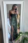 The photos of this dress do not do it justice. It is absolutely stunning in person and so comfortable. Buy this dress, any color, for any event. You will not regret it. - Nicole P.
