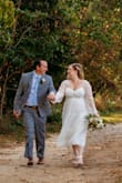This dress exceeded my expectations! It was the perfect dress for our civil ceremony. I did order a large originally and it was a little too tight in the bust area. I ended up sizing up to an XL. If you are between sizes or larger in the bust area, consider going up one size. The only alterations I needed were in the wrists since they were a little too wide for my wrist size after sizing up. I am so happy with how this dress turned out! :) - Elizabeth S.