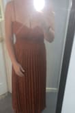 Beautiful color and design. Perfect fall formal event dress. 

I was a little concerned after reading initial reviews about zipper so wore out a few weeks before my event to make sure would hold up and it was fine. Hoping it will last through the rehearsal dinner I'm wearing it to in a few week as well. BMI is 33. I am 36DD and 140 pounds and was def a bit tight on the chest worse with sitting of course. Not much stretch so would def go up a size if non-proportionate to above or want chest to be looser/more comfortable. - Katie W.