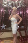 This dress is very unique and accentuated my curves in all the right places with design. Love how sparkly, bold and playful it was. Got several compliments. - Katie W.
