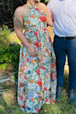 I absolutely love this dress! It was tight up top when zipping it, but it fit perfect everywhere else. I would size up in the future. I got a ton of compliments and it's exactly what I was looking for! - Justyce O.