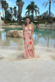 This was the perfect dress for an Italian beach wedding. I got so many compliments. I felt gorgeous. Only problem is at 6'3 the dress is slightly long but I just held it up when I walked. - Patricia P.