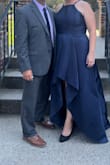 Great dress, had to go up a size for the zipper to make it over the rib cage.

Problem is it was then a little too large in the bust. Still, looked good, great cut and drama for the price. - Caroline S.