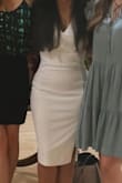 I wore this dress for a graduation dinner, and it was a knockout choice. It cinches you at the waist in the best way. I wore it with some light shapewear underneath that accentuated that even more, but you can get away without any. I am 5'2" and I wanted a midi-length dress but one that didn't make me look short or stumpy, and this did the trick. It is not transparent either, which is really important in a white dress. - Ary D.