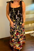 The dress fit perfectly. Keep in mind the fabric is heavier but otherwise amazing. - Taylor S.