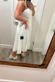 Perfect for an elopement by the beach! I definitely recommend NOT wearing a bra under this to keep the spots for boobs from shifting - Haley S.