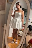 This was my first time ordering Lulus and I am very satisfied! Bought this for my bachelorette.
The dress needed a good steam when it arrived and it was too large for me to lace it in the back and for it to look nice so I decided to sew buttons instead. But the quality was great and I am happy. - Daphnee P.