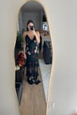 I'm between a size 8 and 10 and got a large. Love it! It's pretty long though even for me who is 5'9 - Alyssa F.
