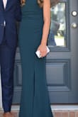 My 14-year-old is thin, so finding a dress for her in a local store was impossible. This dress literally fit her like a glove. The length was perfect with the gold, block heels she chose, and the boning in the bodice held it in place. The dress was lined, and the fabric was flowy. The color was gorgeous!  We did have to lower the slit in order to meet the school's dance dress code, but otherwise it was perfect.  Simple. Elegant. Classy.  Perfection. - Tracie H.