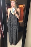 The dress gives me all the boho-chic feels! I'm obsessed!! I was nervous that it would look frumpy on my mom-bod, but it's quite the opposite. I feel feminine and effortless and it goes great with all my favorite summer hats and birkenstocks. The fabric is quality, actually nicer than I had expected. It's a great weight but also light and breezy at the same time. I love the pockets and that the spaghetti straps are adjustable, too. I have the straps tightened a little over 1/2 way and makes it just the right length and neckline for me.  The pockets do add a little bulk to the hip area but I think it actually adds shape to the dress and you can clearly tell that they are pockets. I plan to go braless with this but a sticky bra or bandeau would work just fine. - Karin B.