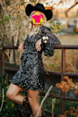 My daughter wore it to homecoming. She wanted a classic look, but her date is a cowboy so she pared it with boots and a hat for a few pictures. It was STUNNING both ways! The sequins pop at all times and looks incredible in pictures. It is well made, comfy, modest yet flirty and would flatter anyone. No worries about it snagging like others have mentioned. A quick shake of the fabric will resolve it, but it never snagged while she wore it. It really is a showstopper! - Kara P.