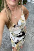 This is a very comfortable, flattering dress. I absolutely love this. Length was great. The fabric is a little giving so it would stretch a little. Zipper is good. I even put a little weight on and it still fits. - Sheronica C.